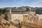 Along the walls of Jerusalem strolls woman pilgrim