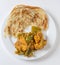 Aloo capsicum curry and paratha high angle