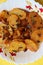 Aloo Katli or Potato Katli is an excellent and tasty asian dish, slices of fried potatoes, sauces and herbs, snack or starter