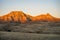 Alpenglow on badlands mountain cliffs in Eastern Montana