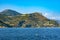 Alpes rocky shore at French Riviera of Mediterranean Sea seen from Saint-Jean-Cap-Ferrat resort town in Cap Ferrat cape in France