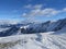 Alpes ski resort slopes, mountain panorama and sun aerial view, Austria, Austria Alps