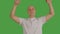 Alpha channel included footage: adult bald man rise up pull move some board, banner, panel or any advertising thing from