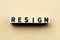 Alphabet block in word resign on wood background
