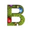 Alphabet on Christmas tree. The letter B cut out of paper on a background fresh ï¿½hristmas tree with colored balls. Set of