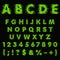 Alphabet, letters, numbers and signs made of green slime, liquid. Isolated colored vector objects.