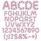 Alphabet, letters, numbers and signs from pink and white sweets.