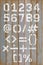 Alphabet number white color paint on wood retro color background