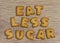 Alphabet Shaped Cookies Saying Eat Less Sugar