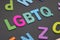 Alphabetic of colorful wooden with LGBTQ word on black background. Concept of LGBT activism