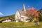 Alpine Church in Autumn