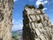 Alpine climbers on the Ebenalp mountain cliffs in the Appenzellerland region and Alpstein mountain range