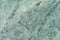 Alpine close-up grunge green stone or rock texture in different colours