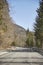 Alpine country road in the Austrian Alps - Stock Photo