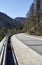 Alpine country road in the Austrian Alps - Stock Photo