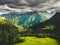 Alpine countryside landscape with high mountains. Kamnik Savinja Alps, Logar valley, Slovenia, Europe.