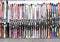 Alpine downhill skis of different brands such as Atomic, Rossignoli, Fischer etc