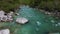 Alpine emmerald river soca in slovenian alps 4k aerial view - fresh water concept