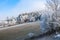 Alpine farm house covered with hoar frost, rime