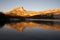 Alpine Glow on Cathedral Peak reflected in the lake