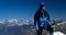 Alpine hiker man in the mountains