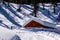 Alpine hut in the snow