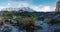 Alpine lake eibsee and mountain range zugspitze in the evening