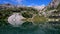 An alpine lake with emerald waters, the jewel of the Dolomites