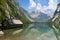 Alpine Lake Obersee with boat house in Bavaria, Germany.