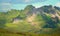 Alpine landscape Brienzer Rothorn mountain, green pasture and view to lake Brienzersee, switzerland
