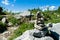 Alpine landscape with cairn or stone marker, Tyrol, Austria