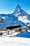 Alpine landscape with chairlift station of ski resort at foot of Matterhorn peak