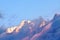 Alpine landscape with peaks covered by snow