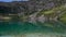 Alpine landscape on the Ritorto lake, the jewel of the Dolomites with emerald waters