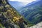 Alpine landscape, Saviese, Switzerland. Green forested slopes with rocky outcrop