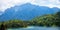 Alpine landscape at springtime, lake Lautersee and green forest, bavarian mountains