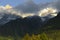 Alpine landscape under the clouds and valley at sunset, Mont Blanc, France.