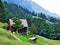 Alpine livestock farms and stables on the slopes of Churfirsten mountain range in the Toggenburg region