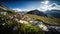 Alpine meadow landscape, filled with blooming alpine flowers and grasses in the springtime.