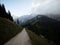 Alpine mountain gravel road way hiking trail path at Rossfeld Panoramastrasse Berchtesgaden Bavaria Germany Austria alps