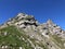 Alpine mountain peak Rossalpelispitz or Rossaelplispitz above the alpine Lake Wagitalersee Waegitalersee, Innerthal