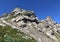 Alpine mountain peak Rossalpelispitz or Rossaelplispitz above the alpine Lake Wagitalersee Waegitalersee, Innerthal