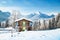 Alpine mountain scenery with cabin in winter