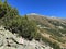 Alpine mountaineering signposts and markings in the mountainous area of the Albula Alps and above the mountain road pass Fluela