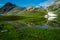 Alpine mountains reflected in lake