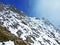 Alpine peak Falknis in the Ratikon border mountain massif or Raetikon Grenzmassiv and over the river Rhine valley Rheintal