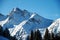 Alpine peaks covered with fresh snow