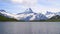 Alpine peaks and mountain lake. Landscape background. Bachalpsee lake, Grindelwald, Bernese highland. Alps, tourism