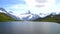 Alpine peaks and mountain lake. Landskape background. Bachalpsee lake, Grindelwald, Bernese highland. Alps, tourism