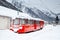 Alpine red train Montenvers Mer de Glace in snow